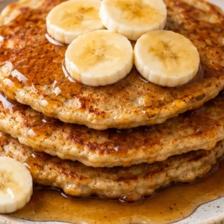 Banana Oatmeal Pancakes! - banana pancakes - Discover the ultimate banana pancakes! Made with wholesome oats, these fluffy, gluten-free delights are secretly he