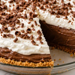Decadent Chocolate Pie Bliss! Discover the best gluten-free chocolate pie recipe! Easy to make with a rich, creamy filling and buttery GF crust. Perfect for any