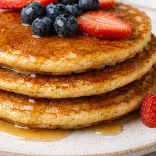 Fluffy Coconut Flour Pancakes - Discover the best coconut flour pancakes! This easy recipe delivers fluffy, moist, gluten-free results in under 30 minutes. Perf