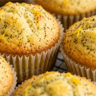 Bursting Lemon Poppy Seed Muffins ️ - Lemon poppy seed muffins: Bake these perfectly tender, gluten-free muffins in under 30 minutes. Bursting with zesty flavor