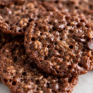Melty Chocolate Lace Cookies! So Crispy & Delicious! Lace cookies: master these crispy, delicate, and chocolate-filled gluten-free cookies. Perfect for a quick