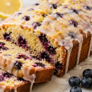 Bursting Lemon Blueberry Bread! Sweet & Zesty! Lemon blueberry bread: bake this tender, zesty loaf perfect for breakfast or dessert. Packed with fresh flavors,