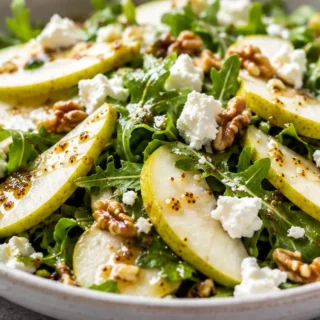 Pear & Goat Cheese Salad: A Taste Sensation! - pear salad - Pear salad: whip up this vibrant and refreshing pear and goat cheese salad with a homemade maple vin