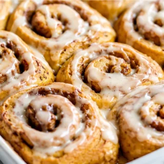 Pumpkin Cinnamon Rolls: Fall Dream! Pumpkin cinnamon rolls: whip up these soft, spiced, and utterly delicious gluten-free rolls. Perfect for a cozy breakfast or