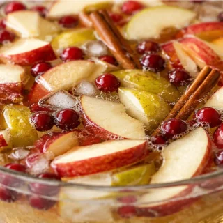 Fall's Favorite: Sparkling Apple Cider Sangria - Apple cider sangria: mix this refreshing fall cocktail with white wine, crisp apples, and pears. Master the per