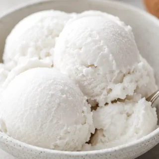 Dreamy 3-Ingredient Coconut Sorbet! Coconut sorbet: churn this incredibly creamy, refreshing dessert with just three ingredients. Perfect for a simple, dairy-fr