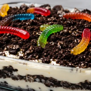 " "Worm" Dirt Cake: Easiest No-Bake Treat! Dirt Cake: enjoy this classic no-bake dessert. Layer creamy pudding and Oreo crumbs for a fun, easy treat. Perfect f
