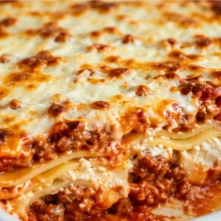Creamy Gluten-Free Lasagna Recipe! - Gluten Free Lasagna - Gluten Free Lasagna: Savor this hearty, flavorful dish with tender noodles and rich meat sauce. Perfe