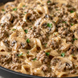 Creamy Ground Beef Stroganoff - Ground beef stroganoff: master this rich and creamy one-skillet recipe with tender mushrooms and savory beef. Perfect for a sati