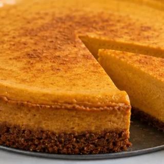Creamy Pumpkin Cheesecake: Fall's Dream Dessert! Pumpkin cheesecake: bake this lusciously creamy, spiced dessert with a gluten-free crust. Perfect for holiday g