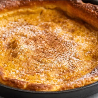 Puffy Pumpkin Dutch Baby: Fall Brunch - Pumpkin Dutch Baby: bake this puffy, gluten-free pancake in a skillet. Infused with warm spices, it's an easy and impres