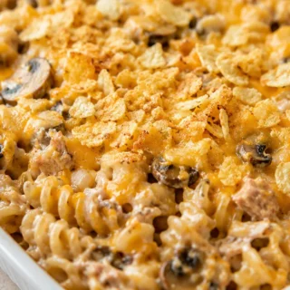 Viral GF Tuna Noodle Casserole! So Creamy! Tuna Noodle Casserole: Enjoy this comforting gluten-free version featuring a creamy mushroom sauce and a savory potat