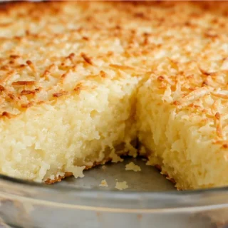 Dreamy Crustless Coconut Pie Recipe - Crustless coconut pie: bake this creamy, jiggly, and sweet dessert. Perfect for a gluten-free treat that tastes homemade a
