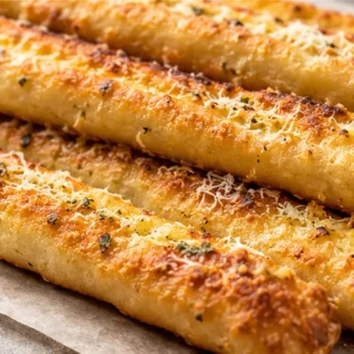 Crispy Garlic Gluten-Free Breadsticks - Gluten-Free Breadsticks: bake these golden, savory breadsticks with a delicious Parmesan garlic butter topping. Perfect
