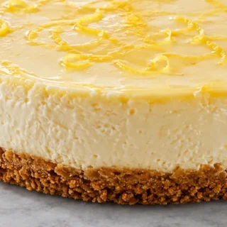 Gluten-Free Lemon Cheesecake Recipe - gluten-free cheesecake - Gluten-free cheesecake: bake this creamy, dreamy dessert with a delicious graham cracker crust. P