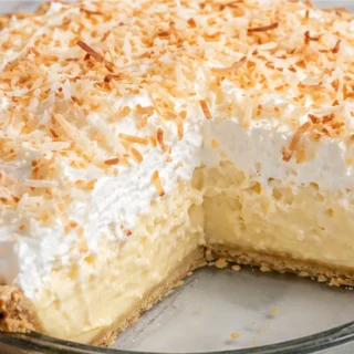 Irresistibly Creamy Gluten-Free Coconut Cream Pie! Gluten-free coconut cream pie: savor this creamy, tropical treat that everyone will love! Perfect for any gat